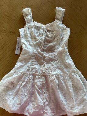 White Eyelet Sundress with shorts under size 2 with Button Front. New with tags